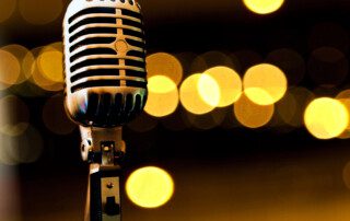 A microphone in a modern recording studio