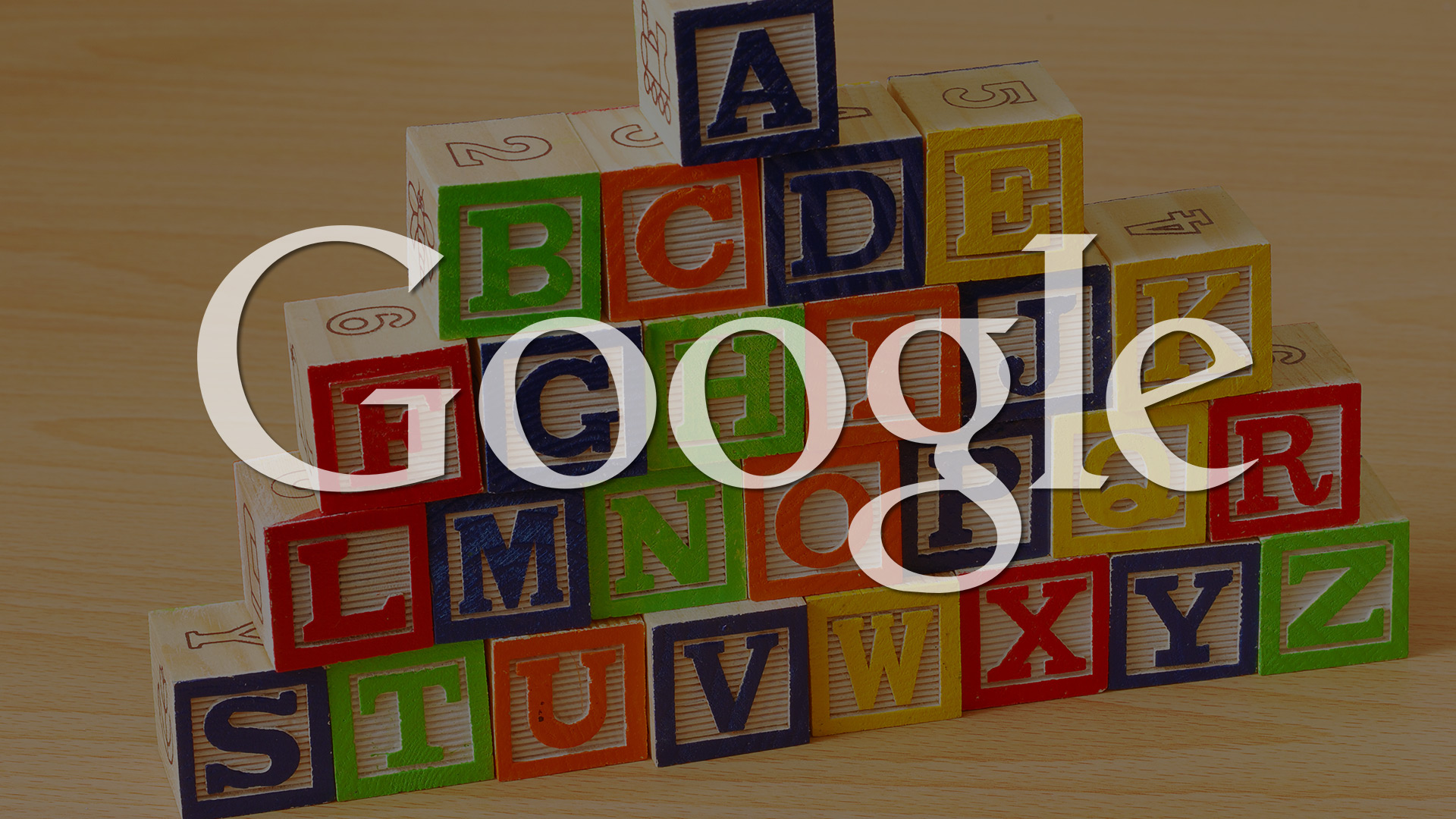 The Google logo in front of some toy blocks