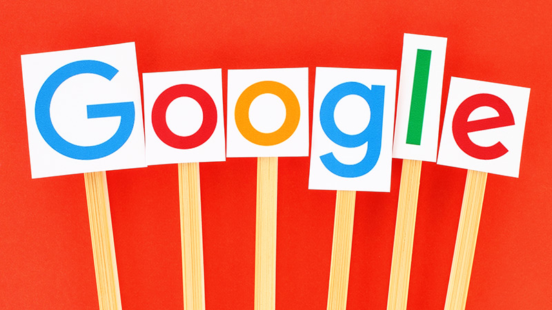 A google logo, cut out and arranged on Popsicle sticks
