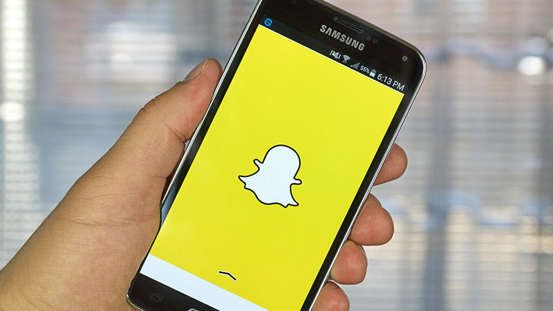 The Snapchat logo on a smartphone