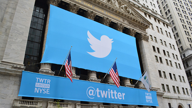 The Twitter logo, on a banner over the New York Stock Exchange