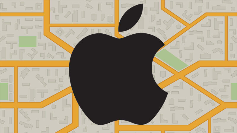 The Apple logo over top of a map