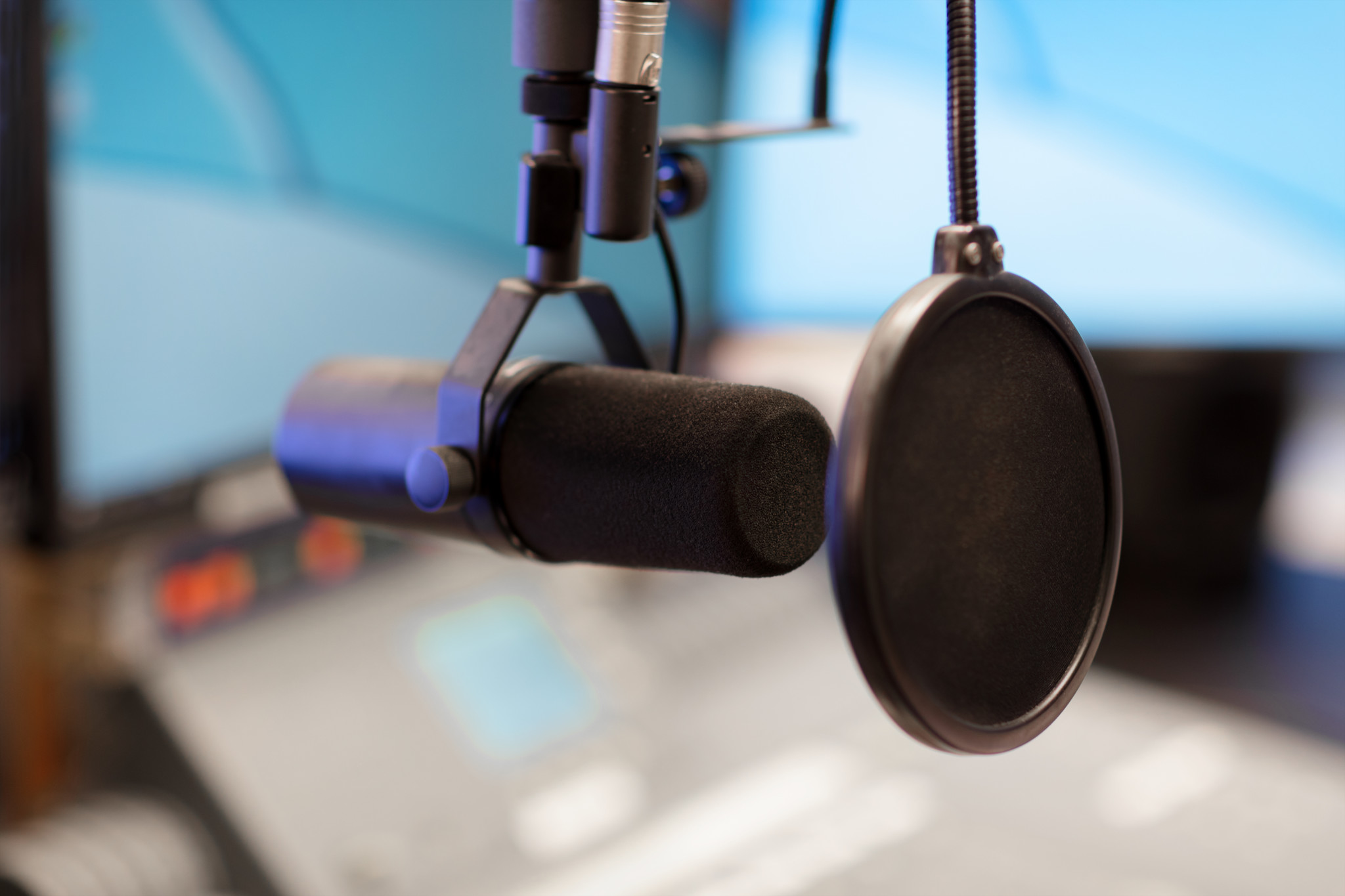 A microphone in a modern recording studio