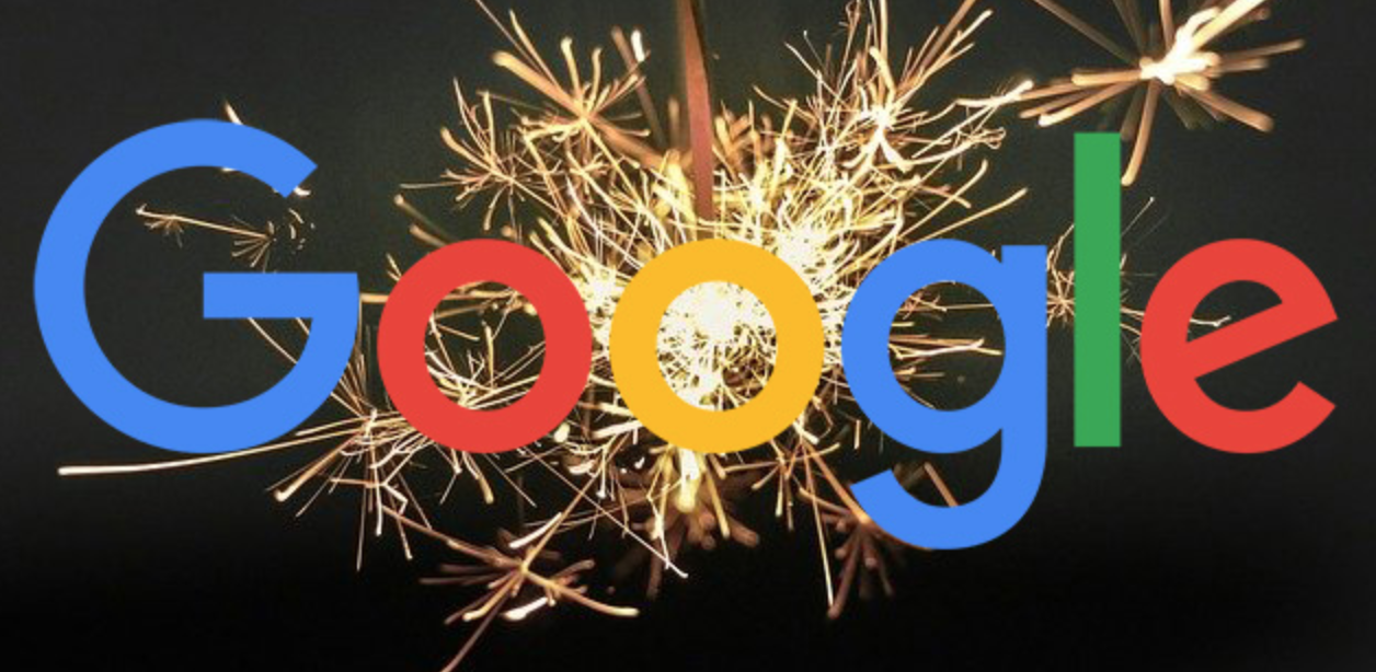The Google logo over some new year's fireworks